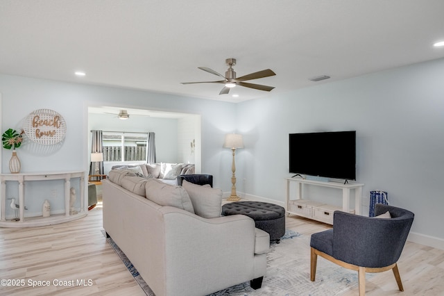 122 Poinsetta St, Indialantic, FL 32903 - living room with ceiling fan, light wood-style flooring, and recessed lighting