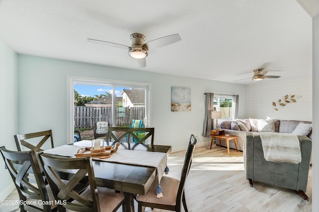 122 Poinsetta St, Indialantic, FL 32903 - dining space featuring ceiling fan, healthy amount of natural light, and light wood-type flooring