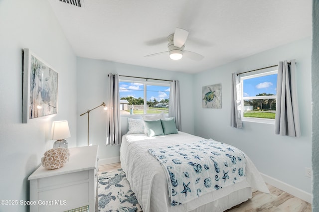 122 Poinsetta St, Indialantic, FL 32903 - bedroom featuring light wood-type flooring and ceiling fan