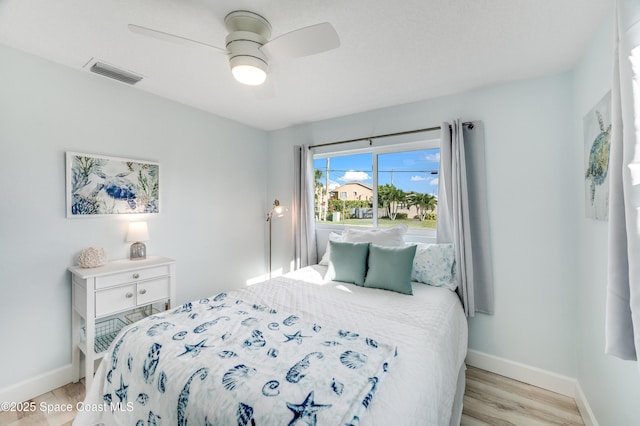 122 Poinsetta St, Indialantic, FL 32903 - bedroom with ceiling fan and light wood-style flooring