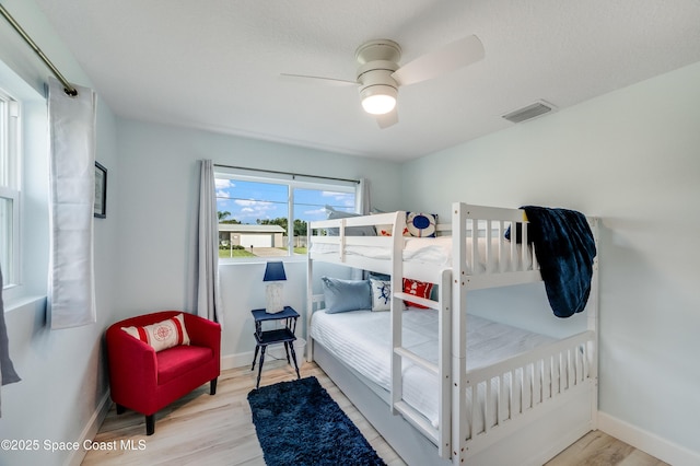 122 Poinsetta St, Indialantic, FL 32903 - bedroom featuring wood finished floors and a ceiling fan