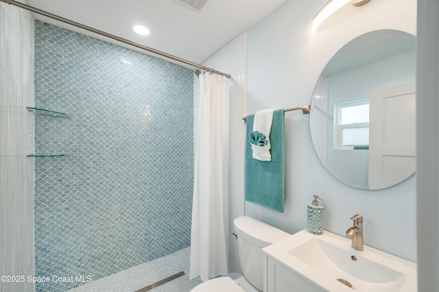 122 Poinsetta St, Indialantic, FL 32903 - full bathroom with a tile shower and vanity