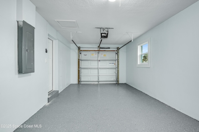 122 Poinsetta St, Indialantic, FL 32903 - garage featuring electric panel and a garage door opener