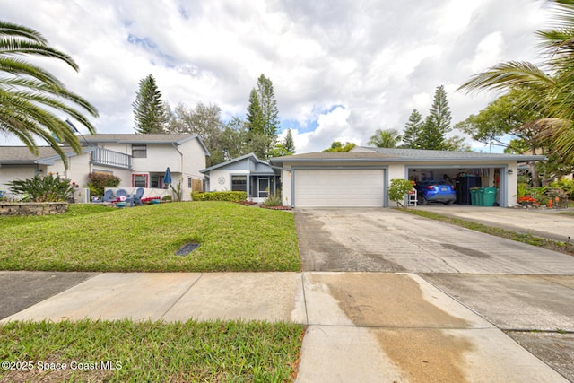 view of front of house featuring a garage, a front lawn, and concrete driveway