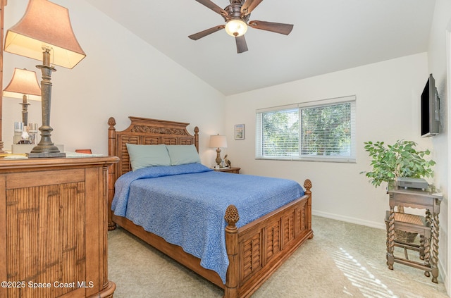 bedroom with lofted ceiling, baseboards, a ceiling fan, and light colored carpet