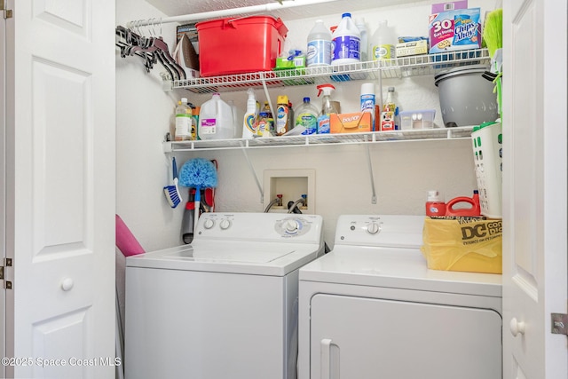 washroom featuring laundry area and independent washer and dryer