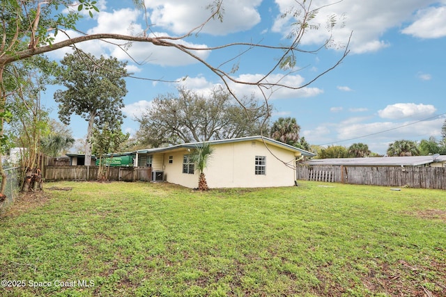 view of yard featuring a fenced backyard and cooling unit