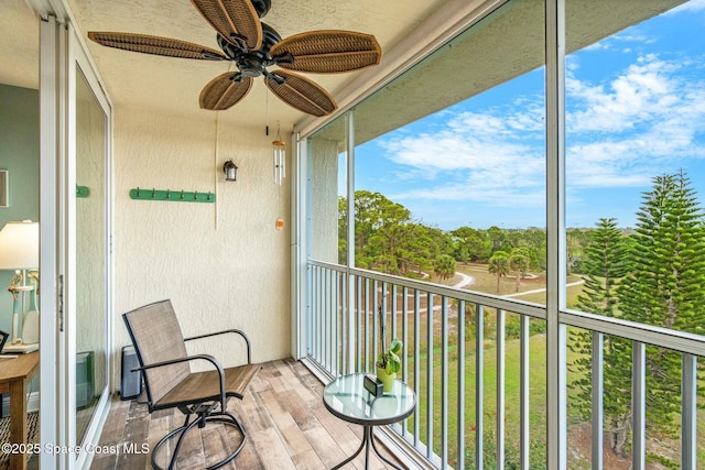 balcony featuring ceiling fan