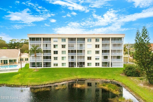 view of property with a water view