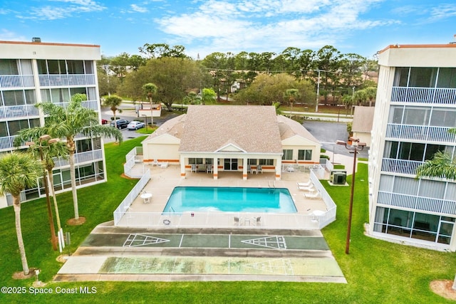 view of swimming pool with a patio area