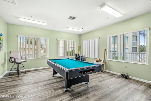 recreation room with visible vents, billiards, baseboards, and wood finished floors