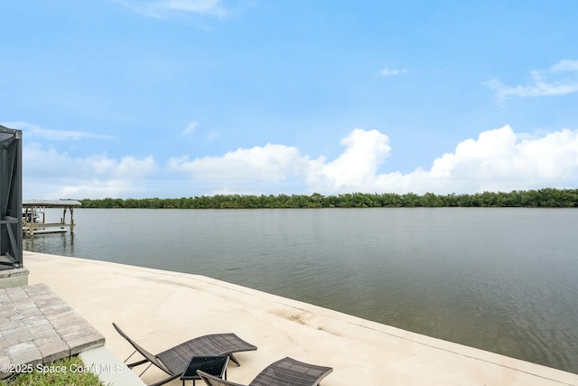 view of dock featuring a water view and boat lift