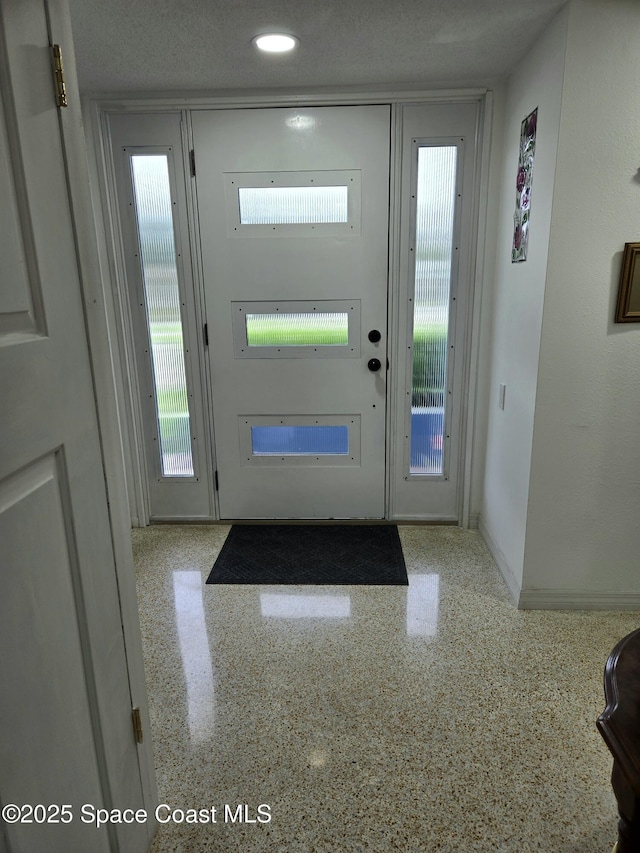 foyer with light speckled floor