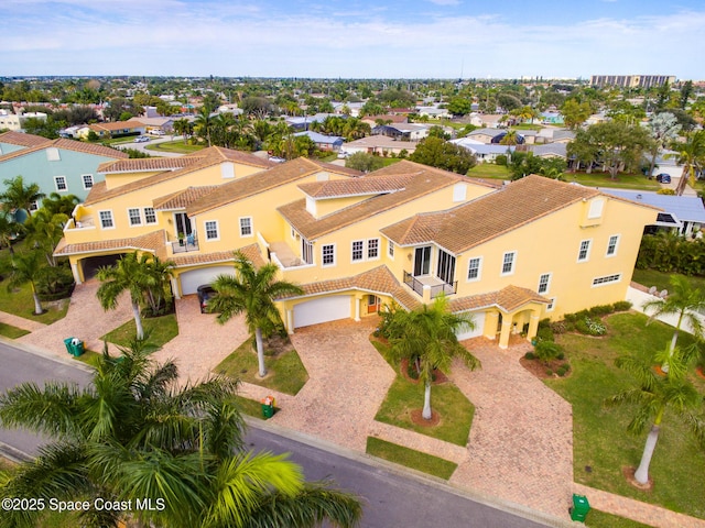 birds eye view of property with a residential view