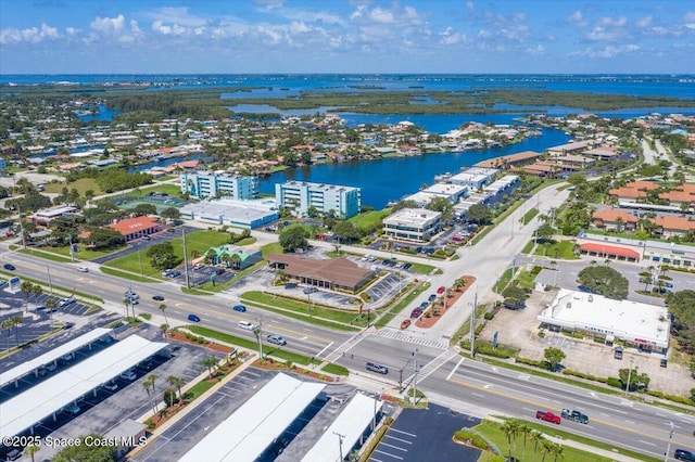 drone / aerial view featuring a water view