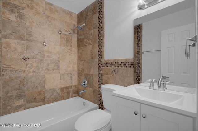 full bath with vanity, bathtub / shower combination, toilet, and tile walls