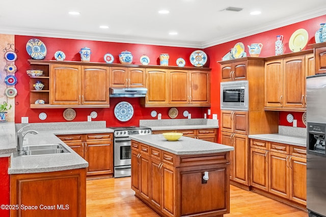 kitchen with a center island, open shelves, stainless steel appliances, light countertops, and a sink