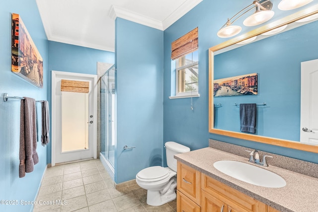 full bathroom featuring toilet, a stall shower, crown molding, and vanity