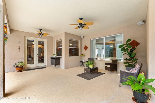 view of patio / terrace with french doors and a ceiling fan