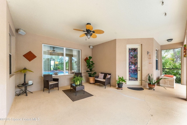 view of patio featuring a ceiling fan