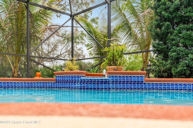 pool featuring a lanai