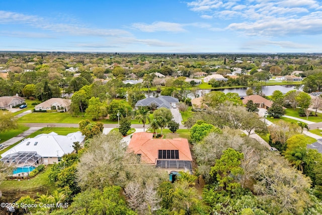 bird's eye view with a water view and a residential view