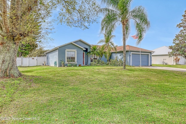 ranch-style house featuring driveway, a garage, stucco siding, fence, and a front yard