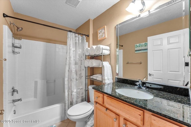 full bath featuring shower / tub combo with curtain, visible vents, toilet, a textured ceiling, and tile patterned flooring