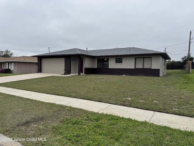 view of front facade featuring a garage, concrete driveway, roof with shingles, and a front lawn