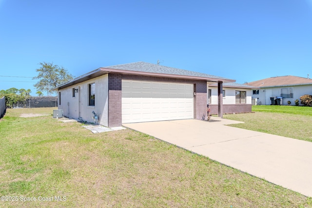 view of front facade featuring brick siding, an attached garage, a front yard, fence, and driveway