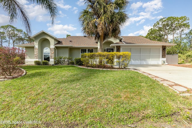 ranch-style house with a garage, concrete driveway, stone siding, stucco siding, and a front lawn