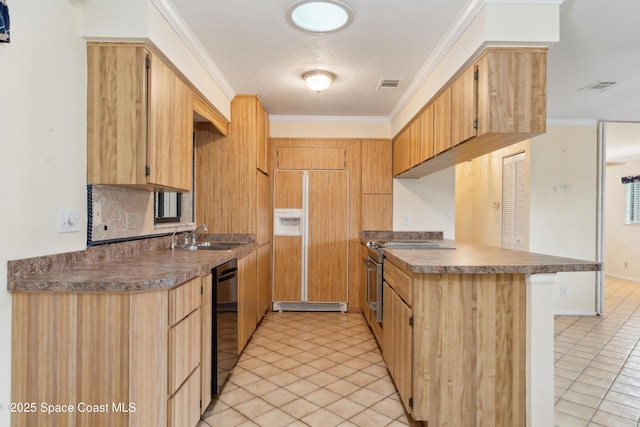 kitchen featuring crown molding, visible vents, premium appliances, and a sink