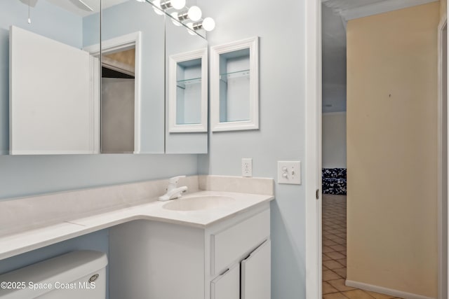 bathroom featuring tile patterned floors and vanity