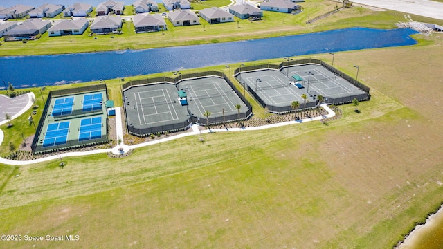 aerial view featuring a water view and a residential view