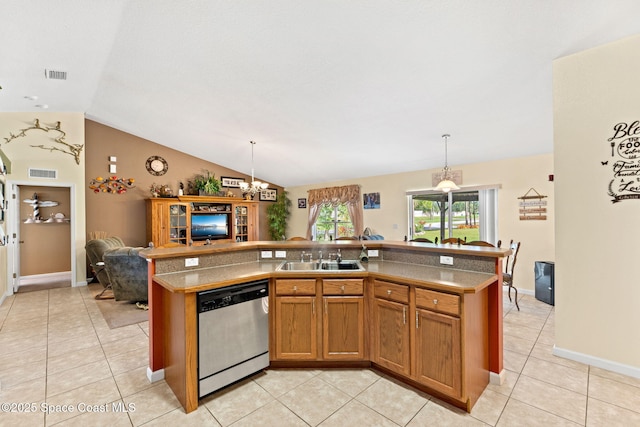 kitchen with open floor plan, stainless steel dishwasher, an island with sink, and visible vents