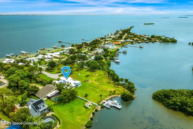 birds eye view of property featuring a water view