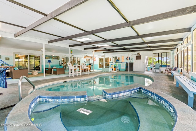 pool with an indoor hot tub