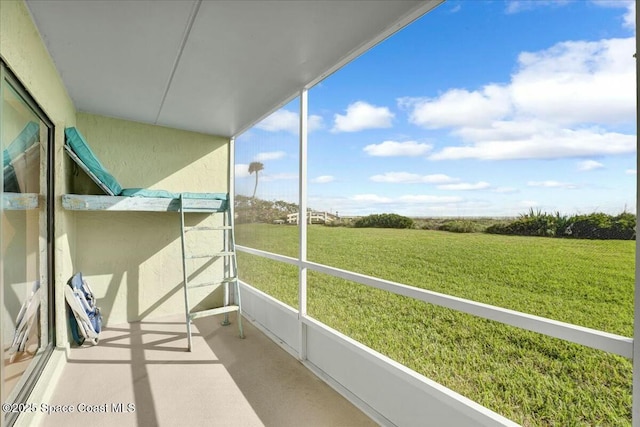 balcony featuring a sunroom