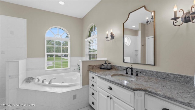 bathroom featuring a bath and vanity