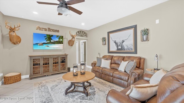 living area with baseboards, visible vents, a ceiling fan, light tile patterned flooring, and recessed lighting