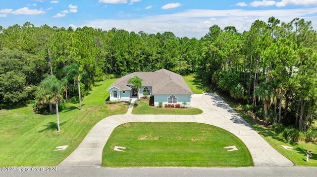 bird's eye view featuring a forest view