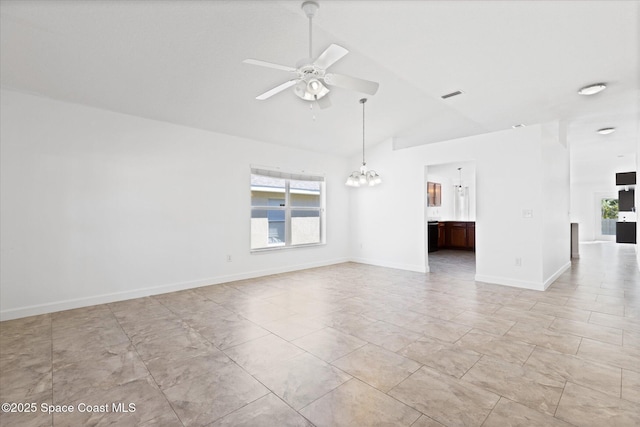 unfurnished room featuring ceiling fan with notable chandelier, lofted ceiling, visible vents, and baseboards