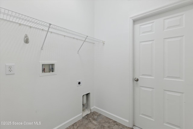 laundry area with laundry area, hookup for a washing machine, baseboards, and electric dryer hookup