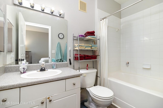 ensuite bathroom featuring shower / tub combo with curtain, visible vents, toilet, connected bathroom, and vanity