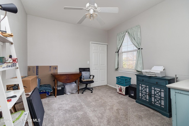 home office featuring carpet and ceiling fan