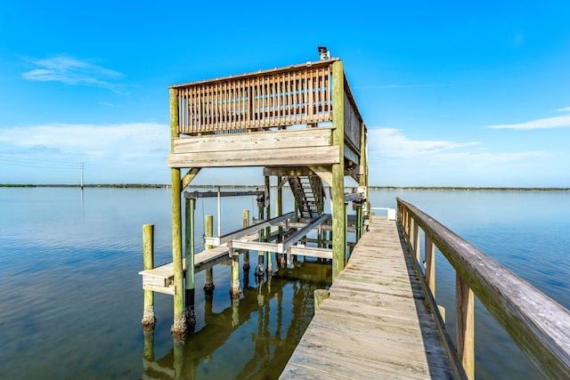 dock area featuring a water view and boat lift