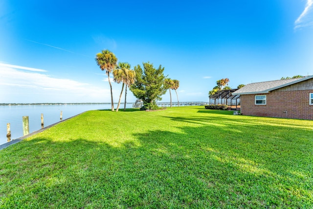 view of yard with a water view