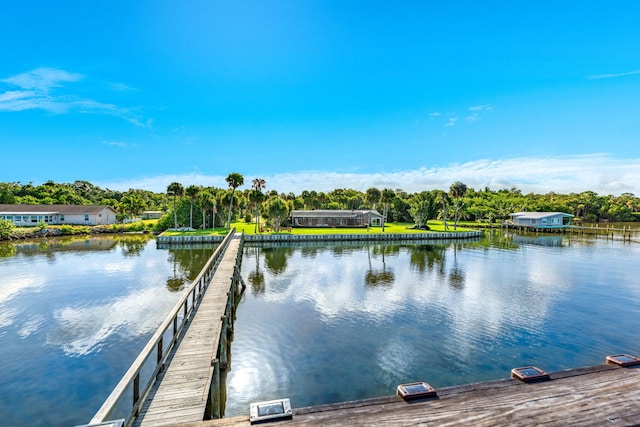 view of dock with a water view