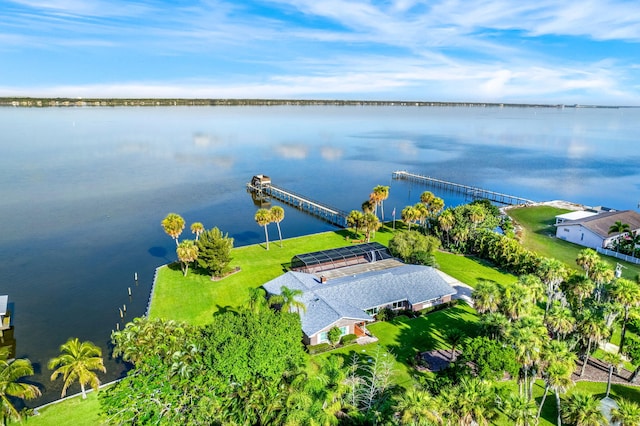 drone / aerial view with a water view