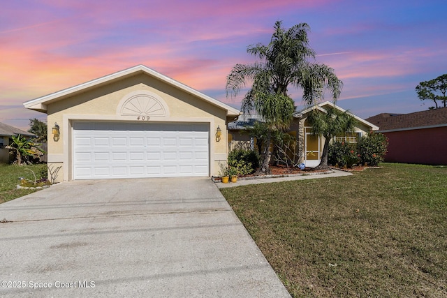 ranch-style home featuring driveway, an attached garage, a front lawn, and stucco siding